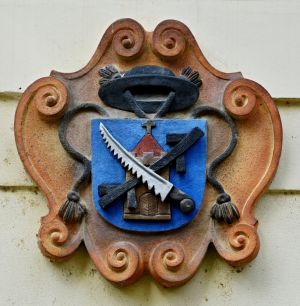 Arms of Parish of Štětí on the parish building façade